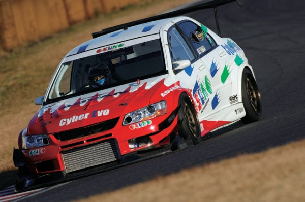 Voltex Cyber Evo front bumper includes front spoiler wet carbon, under wing dry carbon.