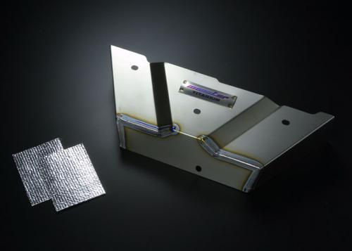 Monster Sport titanium exhaust manifold cover.